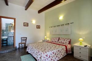 Postel nebo postele na pokoji v ubytování B&B Nonno Stacca