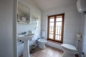 Koupelna v ubytování Albergo La Foresteria
