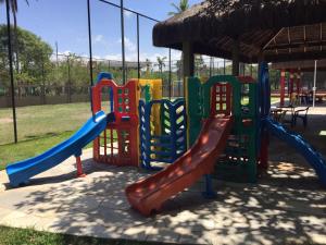 Zona de juegos infantil en Flat no Marulhos Resort na praia Muro Alto
