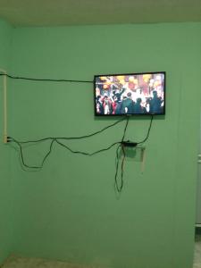 Télévision ou salle de divertissement dans l'établissement Hotel Chaac Calakmul