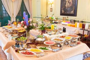 a buffet of food on a long table at Hotel Monterey Nagasaki in Nagasaki