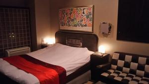 Postel nebo postele na pokoji v ubytování Hotel Sting