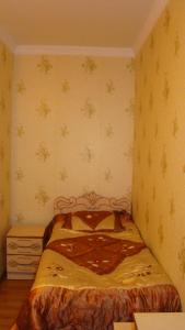 Postel nebo postele na pokoji v ubytování Guest House Tavaduri
