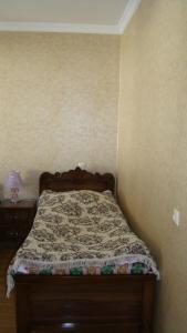 Postel nebo postele na pokoji v ubytování Guest House Tavaduri