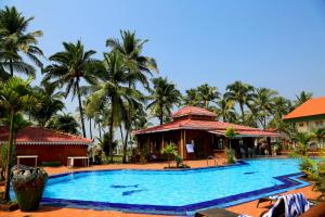 Bazén v ubytování Hotel Goan Heritage nebo v jeho okolí