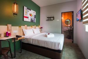 מיטה או מיטות בחדר ב-Finess Basic Hotel