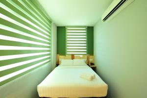 Krevet ili kreveti u jedinici u okviru objekta Finess Basic Hotel