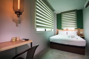 Krevet ili kreveti u jedinici u okviru objekta Finess Basic Hotel
