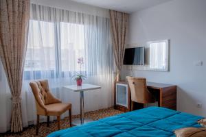 Letto o letti in una camera di New Hotel