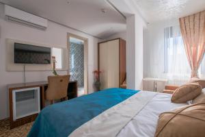 Letto o letti in una camera di New Hotel