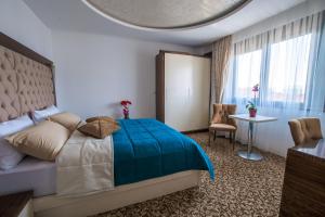 Letto o letti in una camera di New Hotel