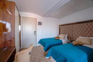Letto o letti in una camera di New Hotel
