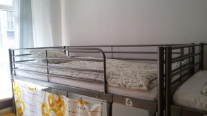 Poschodová posteľ alebo postele v izbe v ubytovaní Lemon Tree Hostel