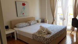 Posteľ alebo postele v izbe v ubytovaní Errathens Wheat Apartment - Athens Center, 3 BD, 1 BATH