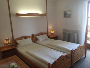 Postel nebo postele na pokoji v ubytování Gästehaus Eder