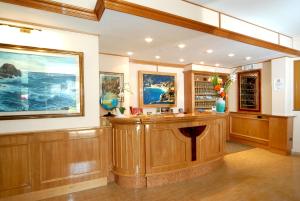 a large room with a bar in a building at Hotel 5 Terre in Monterosso al Mare