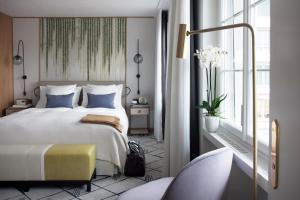 Llit o llits en una habitació de Storchen Zürich - Lifestyle Boutique Hotel