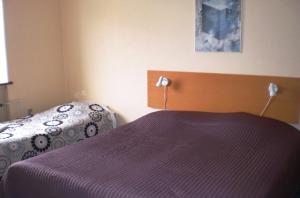 Letto o letti in una camera di Hotel Kong Valdemar