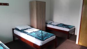 Letto o letti in una camera di Mico NP Guest House