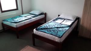 Letto o letti in una camera di Mico NP Guest House