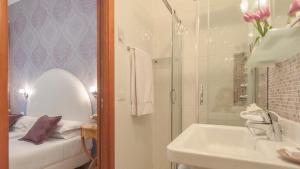 Koupelna v ubytování Ripetta Rooms