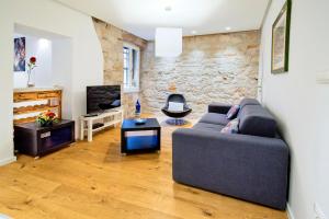 Televízia a/alebo spoločenská miestnosť v ubytovaní Apartment Danalu