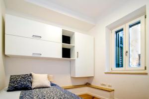 Posteľ alebo postele v izbe v ubytovaní Apartment Danalu