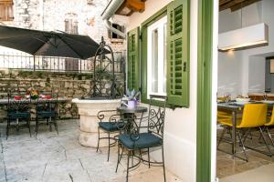 Reštaurácia alebo iné gastronomické zariadenie v ubytovaní Apartment Danalu