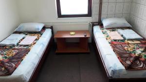 Letto o letti in una camera di Mico NP Guest House