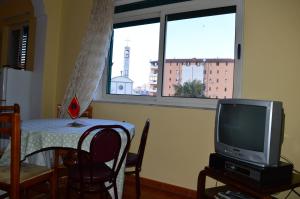 Televisyen dan/atau pusat hiburan di Arka Hostel