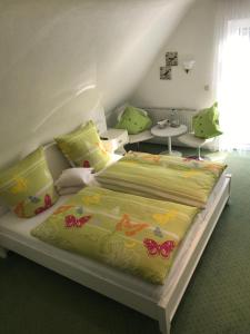 A bed or beds in a room at Haus Marientaler Au