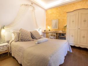 a bedroom with a large bed in a room at Hotel Marina in Monterosso al Mare