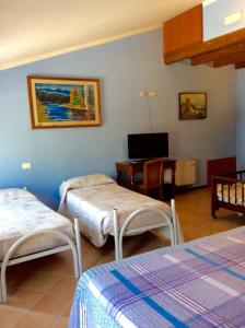 Postel nebo postele na pokoji v ubytování Corte Pioppazza