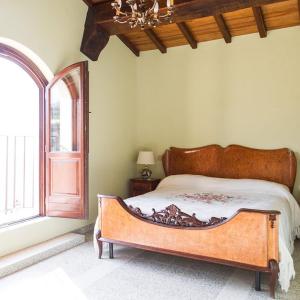 Кровать или кровати в номере De Vita Beata Agriturismo