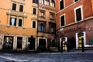 an empty street in a city with buildings at Cibele Bed&Breakfast in Rome