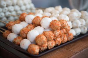 a bunch of balls of food on a table at Sea View Holiday House in Hong Kong