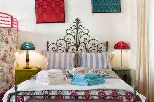 Cama o camas de una habitación en FeelingLisbon Discoveries