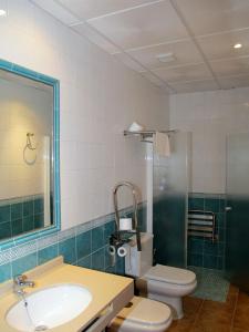 Kylpyhuone majoituspaikassa Apartamentos Rurales El Pinar