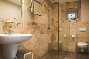 Ένα μπάνιο στο Palazzo Radomiri Heritage Boutique Hotel