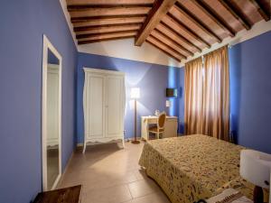 A bed or beds in a room at Albergo La Foresteria Még 37 kép