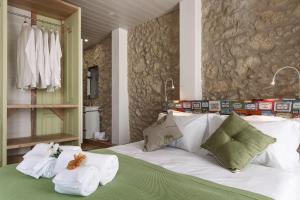 מיטה או מיטות בחדר ב-My Bairro Alto Suites