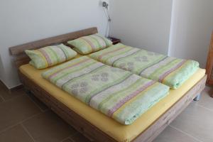 Postel nebo postele na pokoji v ubytování Apartmenthaus Fa