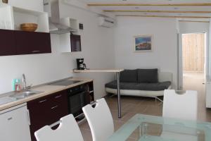 Posezení v ubytování Apartmenthaus Fa