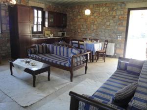 A seating area at Klymeni Traditional Homes