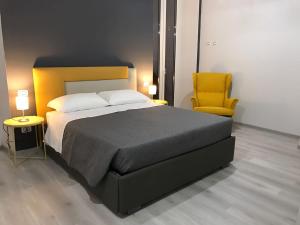 A bed or beds in a room at Sensation House