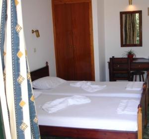 Postel nebo postele na pokoji v ubytování Cohyli Hotel