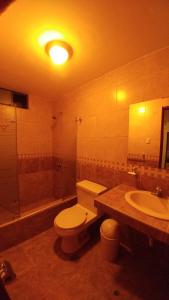 Koupelna v ubytování Libertad Hotel