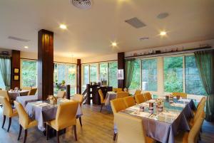 Restoran ili drugo mesto za obedovanje u objektu Ci Meng Rou Resort Villa