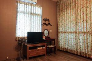 TV a/nebo společenská místnost v ubytování Jia Lin Homestay
