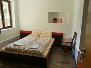 Postel nebo postele na pokoji v ubytování Guest House Zora
